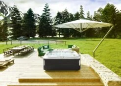 Jacuzzi® J365IP™ - 7 Person Hot Tub -Outdoor Living Hot Tubs JHT J365 Lifestyle SmokedEbony 2000x1414 8c81ab68 faec 442d 8ae4 80987675d845