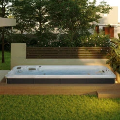 Jacuzzi® PowerActive™ J-19™ - 19ft Swim Spa -Outdoor Living Hot Tubs JSS J19 SmokedEbony Lifestyle V3 3000x2143 72120de5 e3b6 443c 89e8 135869b7a087 0005a4a4 caa8 4492 a762 8da859aabee4